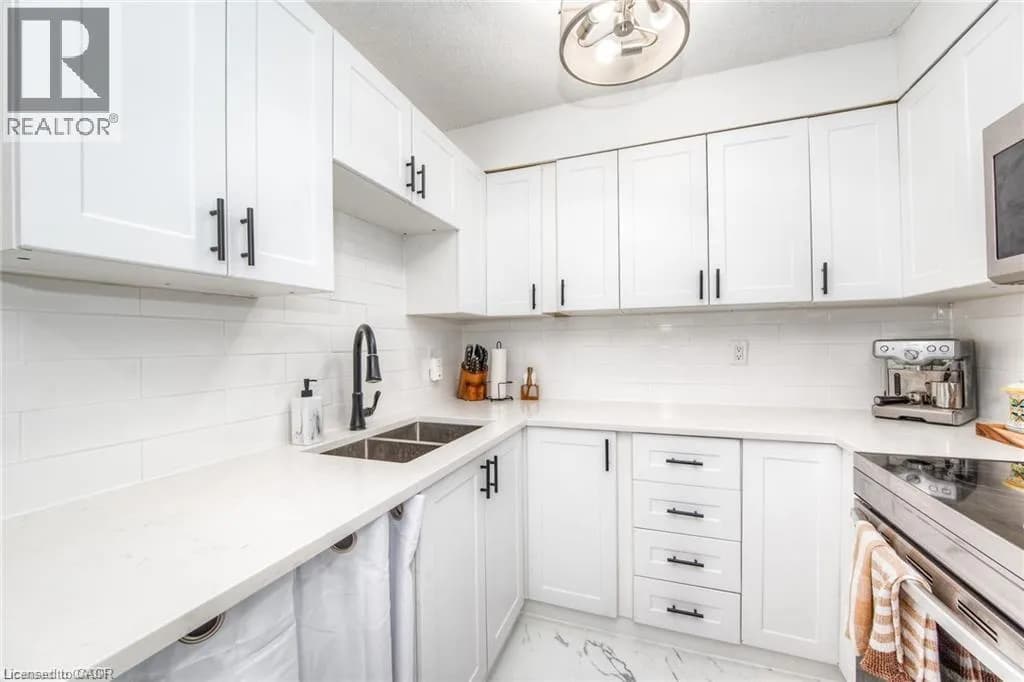 225 HARVARD Place Unit# 402 — photo 1 of 15