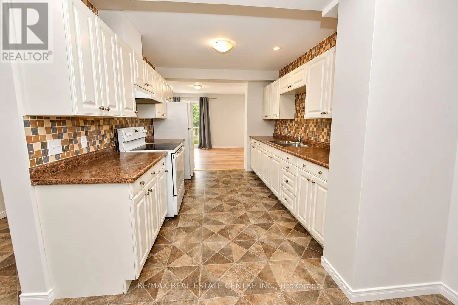 8 - 23 HOWE DRIVE — photo 4 of 14