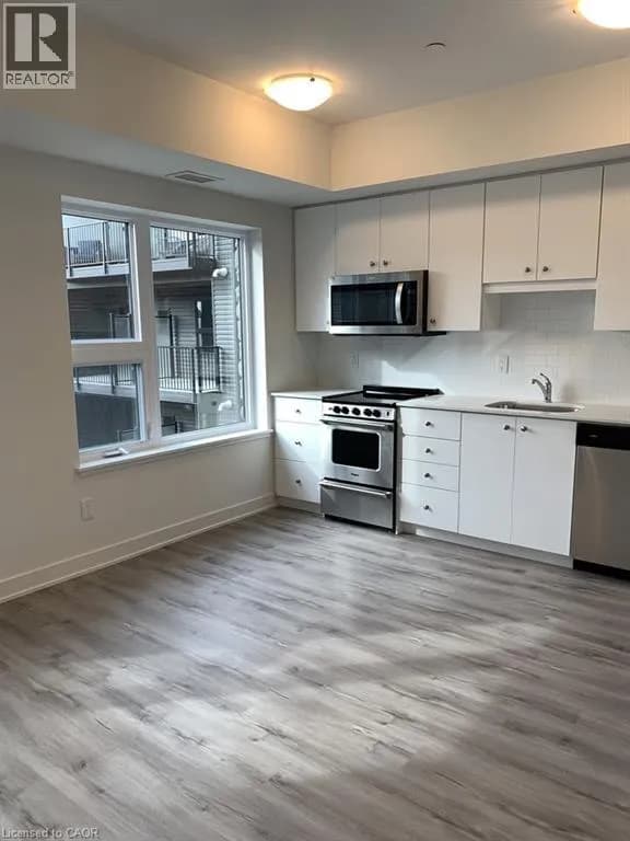 110 FERGUS Avenue Unit# 319 — photo 2 of 24