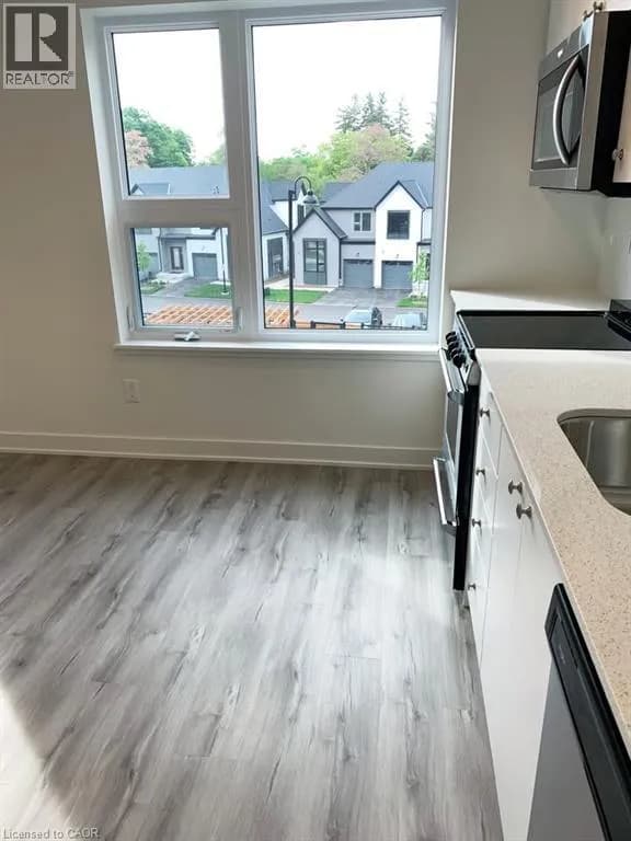 110 FERGUS Avenue Unit# 319 — photo 4 of 24